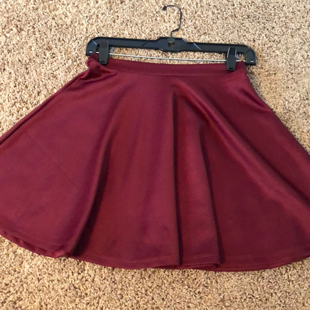 Bouncy burgundy mini skirt!